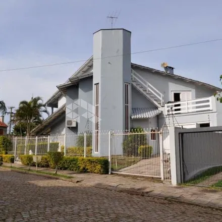 Buy this 4 bed house on Rua Luiz Delfino in Espírito Santo, Porto Alegre - RS