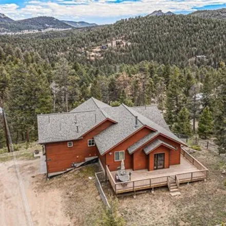 Buy this 4 bed house on 10230 South Buena Vista Drive in Conifer, CO 80433