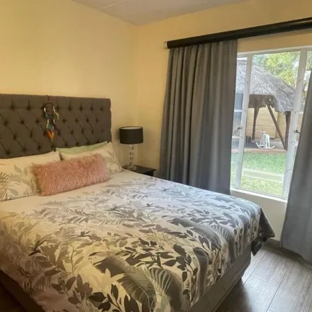 Rent this 2 bed townhouse on 12th Street in Marais Steyn Park, Gauteng