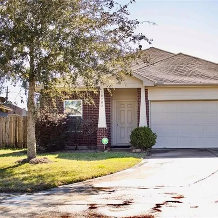 Buy this 4 bed house on 10706 Woodwind Shadows Drive in Towne Lake, TX 77433