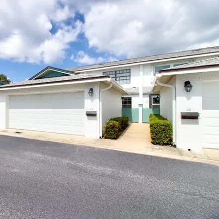 Buy this 2 bed townhouse on 298 Paradise Boulevard in Melbourne, FL 32903