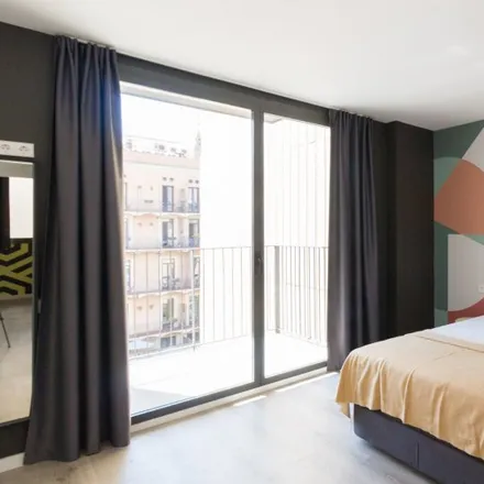 Rent this 3 bed room on MH Apartamens Liceo in Carrer de la Unió, 08001 Barcelona