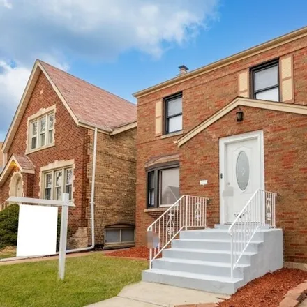Buy this 4 bed house on 6641 South Karlov Avenue in Chicago, IL 60629