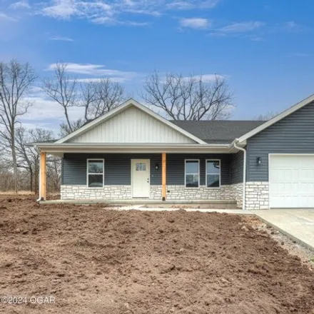 Buy this 3 bed house on 2059 Marigold Street in Carthage, MO 64836
