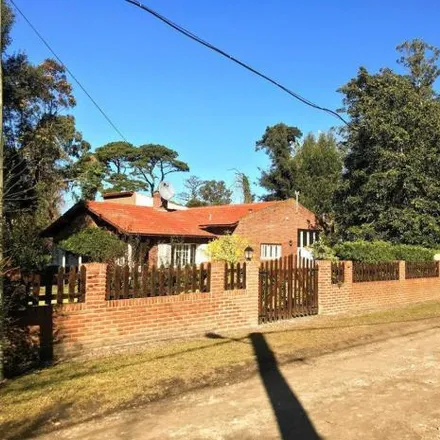 Buy this 3 bed house on La Pasionaria in Bosque de Peralta Ramos, B7603 DRT Mar del Plata