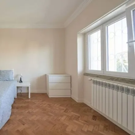 Rent this 4 bed room on Rua Carlos Malheiro Dias 10 in 1700-108 Lisbon, Portugal