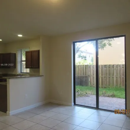 Rent this 4 bed apartment on 23279 Southwest 113th Passage in Princeton, FL 33032