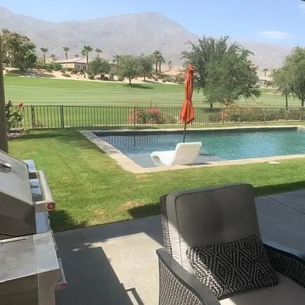 Rent this 3 bed house on 81227 Red Rock Road in La Quinta, CA 92253