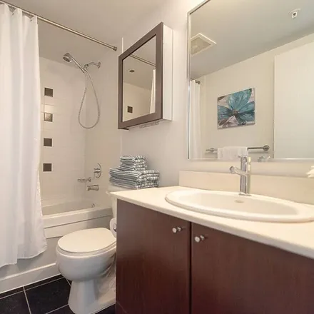 Image 3 - Vancouver, BC V6Z 3G5, Canada - Condo for rent