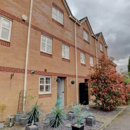 Rent this 4 bed townhouse on Aster Walk in Nuneaton, CV10 7SP