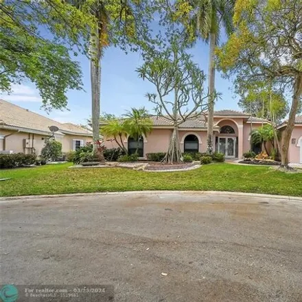 Buy this 4 bed house on 2298 Warwick Hills Way in Coral Springs, FL 33071