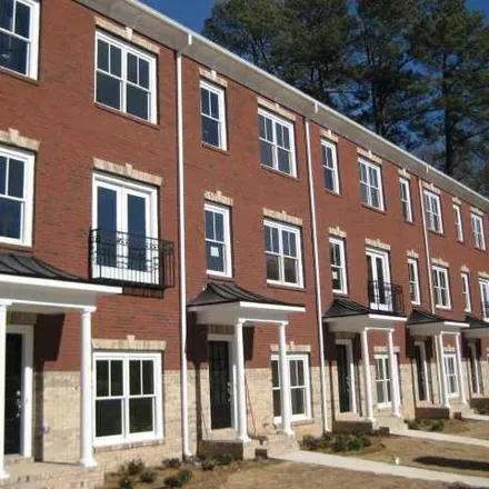 Rent this 3 bed townhouse on 2436 Tristan Circle Northeast in DeKalb County, GA 30345