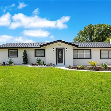 Buy this 4 bed house on 3756 Palm Road in Polk County, FL 33810