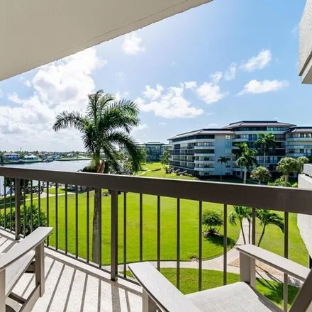 Buy this 2 bed condo on Bayside Court in Marco Island, FL 33937