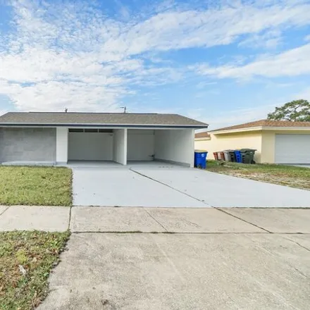 Buy this 4 bed house on 951 Levitt Parkway in Rockledge, FL 32955