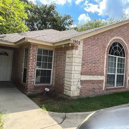 Rent this 3 bed house on 1904 West Sanford Street in Arlington, TX 76012