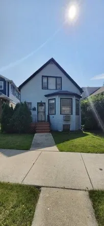 Buy this 4 bed house on 1719 N Merrimac Ave in Chicago, Illinois