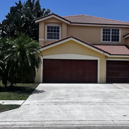 Buy this 5 bed house on 11758 Water Bend Court in Wellington, FL 33414