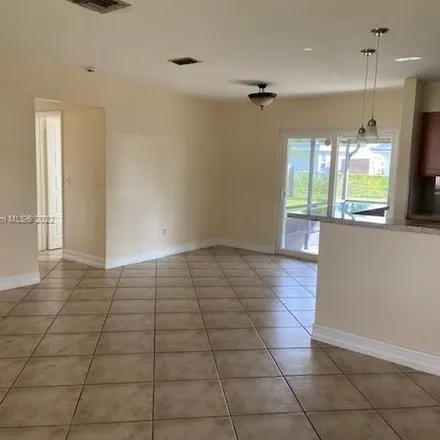 Rent this 3 bed apartment on 8814 Northwest 10th Street in Pembroke Pines, FL 33024