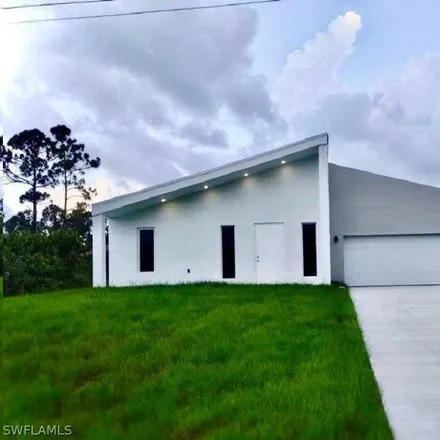 Rent this 3 bed house on East 17th Street in Lehigh Acres, FL 33972