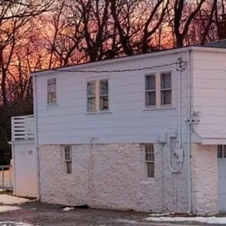 Buy this 4 bed house on KC Used Car Emporium in West 55th Street, Merriam