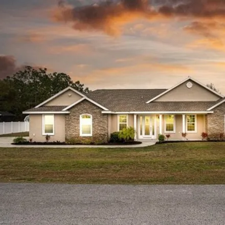 Buy this 4 bed house on 8849 Southeast 162nd Place in Marion County, FL 34491