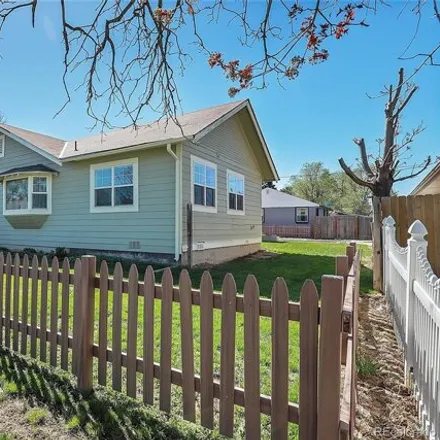 Buy this 3 bed house on 9590 East 13th Avenue in Aurora, CO 80010