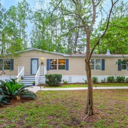 Buy this studio apartment on 18764 Northwest 46th Avenue in Alachua County, FL 32615