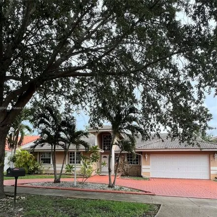 Buy this 4 bed house on 8545 NW 165th Ter in Miami Lakes, Florida