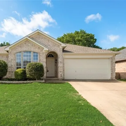 Rent this 3 bed house on 5006 Saddlehorn Drive in Arlington, TX 76017