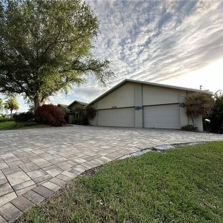 Buy this 4 bed house on 1918 Southeast 2nd Street in Cape Coral, FL 33990