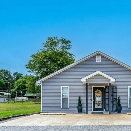 Buy this studio house on 119 South San Francisco Avenue in Caraway, Craighead County