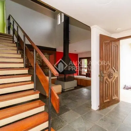 Buy this 3 bed house on Rua Alcebiades Antônio dos Santos in Nonoai, Porto Alegre - RS