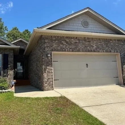 Rent this 4 bed house on 6132 Whitebark Drive in Southridge, Mobile