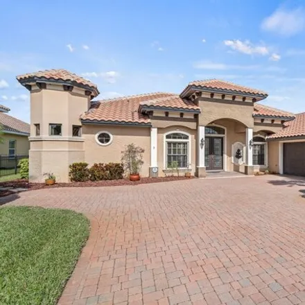 Buy this 4 bed house on 6075 Anello Dr in Melbourne, Florida