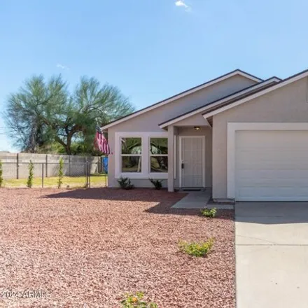 Buy this 3 bed house on 595 East Peppertree Avenue in Apache Junction, AZ 85119