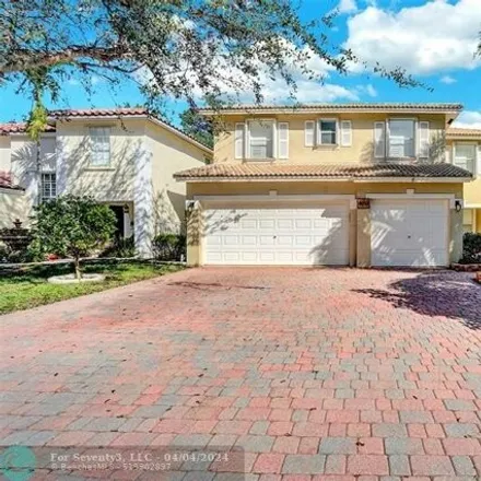 Buy this 5 bed house on 4009 Northwest 63rd Street in Coconut Creek, FL 33073