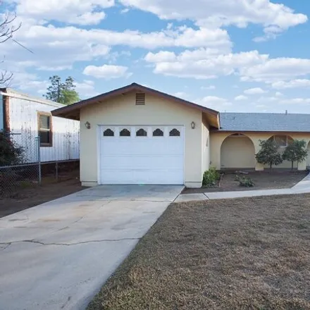 Buy this 4 bed house on 1387 East Alpine Avenue in Tulare, CA 93274