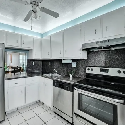 Rent this 2 bed condo on Sands Point Boulevard in Tamarac, FL 33321