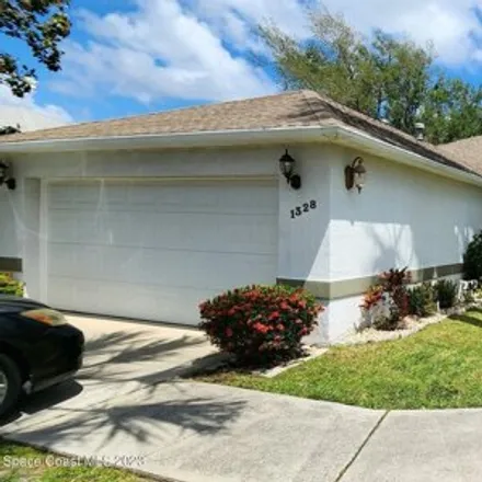 Rent this 3 bed house on Heritage Acres Boulevard in Rockledge, FL
