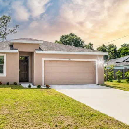 Rent this 4 bed house on 1962 Southwest Aladdin Street in Port Saint Lucie, FL 34953
