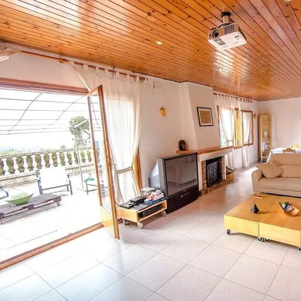 Rent this 4 bed house on 08396 Sant Cebrià de Vallalta