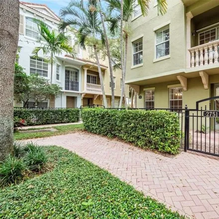 Buy this 3 bed townhouse on 2751 Ravella Way in Palm Beach Gardens, Florida