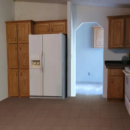 Buy this 4 bed house on 5601 West Pecan Drive in Maricopa County, AZ 85354