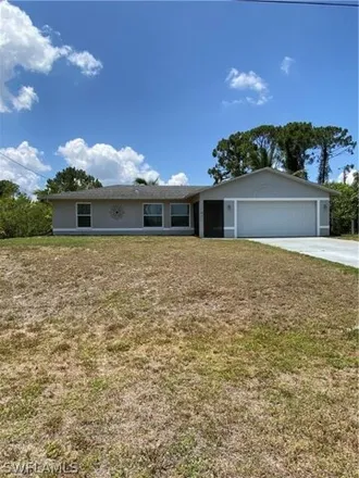 Rent this 3 bed house on 4017 1st Street Southwest in Lehigh Acres, FL 33976