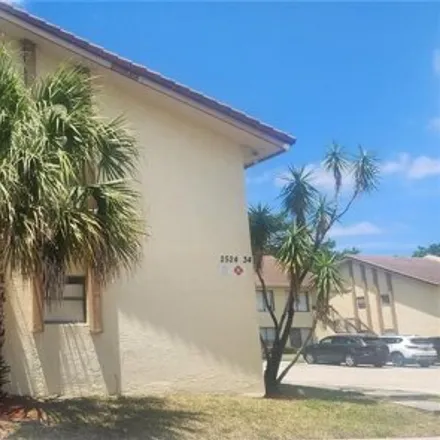 Buy this 2 bed condo on unnamed road in Coral Springs, FL 33065