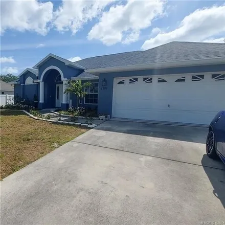 Buy this 3 bed house on 1177 Southwest Ivanhoe Street in Port Saint Lucie, FL 34983