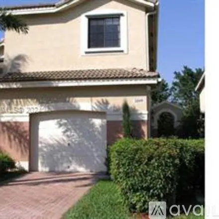 Rent this 4 bed townhouse on 3809 Tree Top Dr