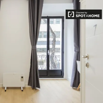 Rent this 8 bed room on Madrid in Calle de Martín de los Heros, 23