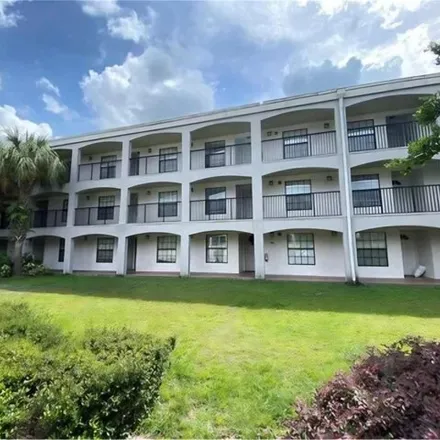 Buy this 2 bed condo on Wind Willow Road in Belle Isle, Orange County